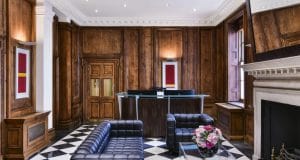 Reception area with fireplace at the Davies Street luxury serviced office property in Mayfair