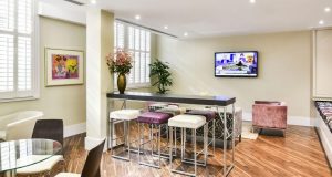 A seating area at the office space for rent on Farm Street in Mayfair