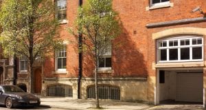 The exterior of the office space for rent on Farm Street in Mayfair with on-street car parking