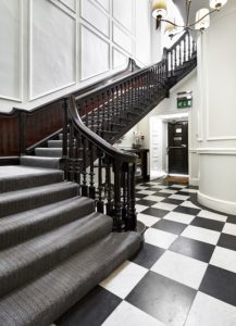 The sweeping staircase at the office space in Mayfair on Bruton Street