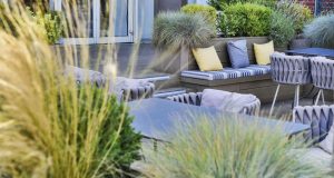 Comfortable seating on the roof terrace together with various planters