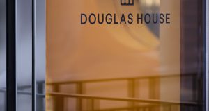 Signage at the entrance of the office property reading Douglas House