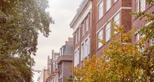 An exterior shot of the luxury office space in Fitzrovia on Great Titchfield Street with trees in the foreground