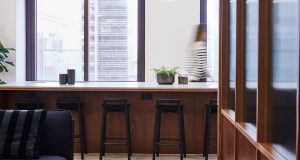 Coworking desks with a view of Canary Wharf at One Canada Square