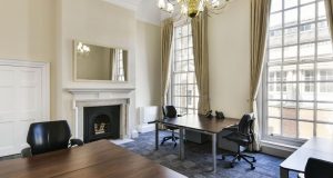 An office suite with large windows for rent