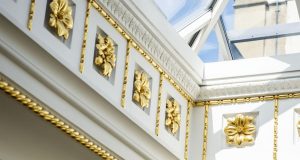 The unique and impressive skylight and ornate plasterwork at the office space on Pall Mall