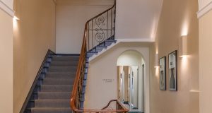 The elegant staircase leading to the serviced offices in Marylebone