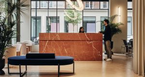 The reception area at Brock House with marble front desk