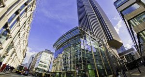 Looking up at the Tower 42 office space building from Old Broad Street in the City of London